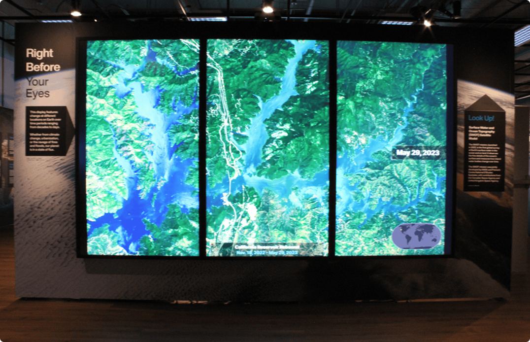 A 3-panel display of NASA's Time Unveiled exhibit.